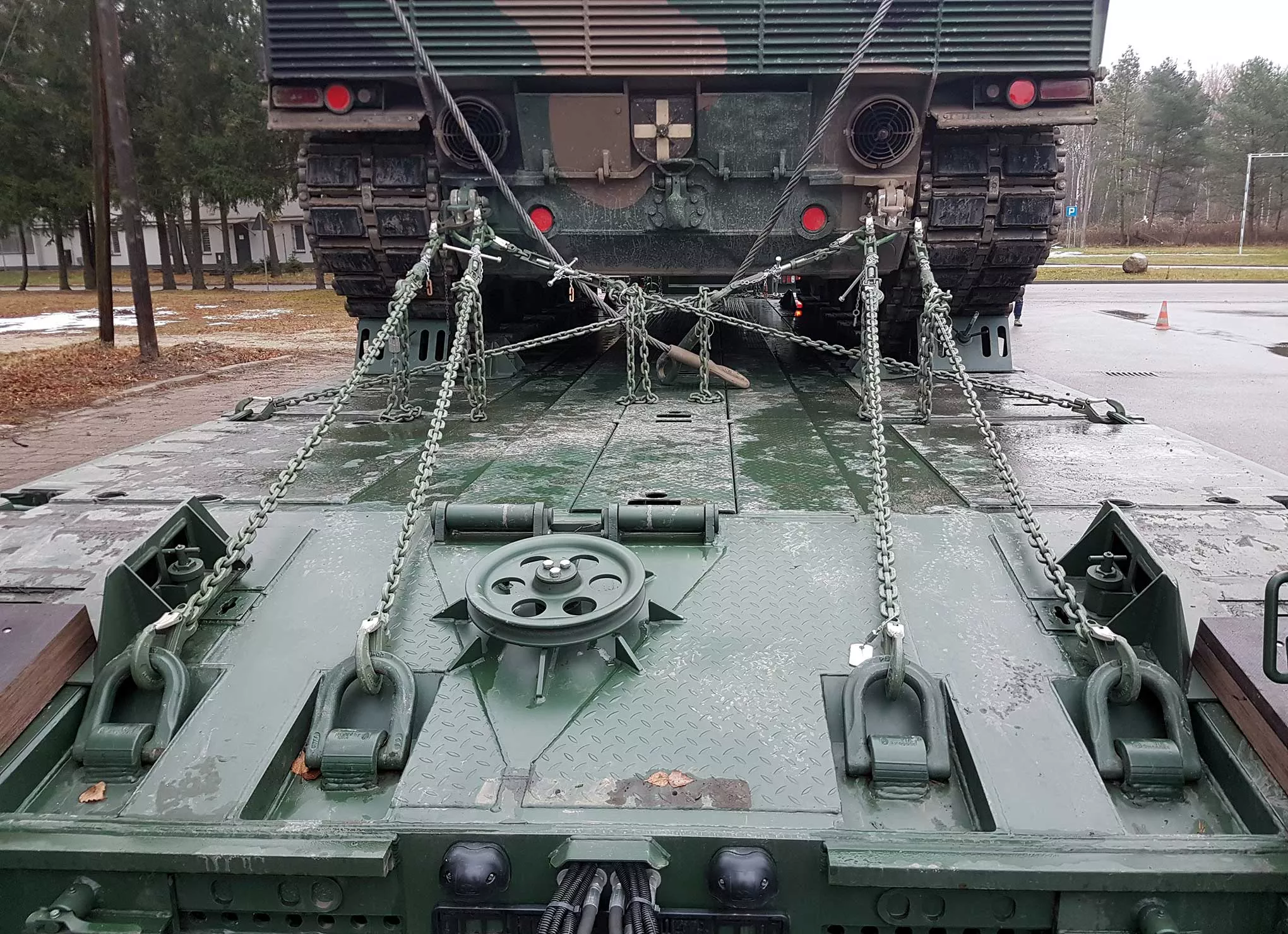 Lashing chains securing military equipment during transport