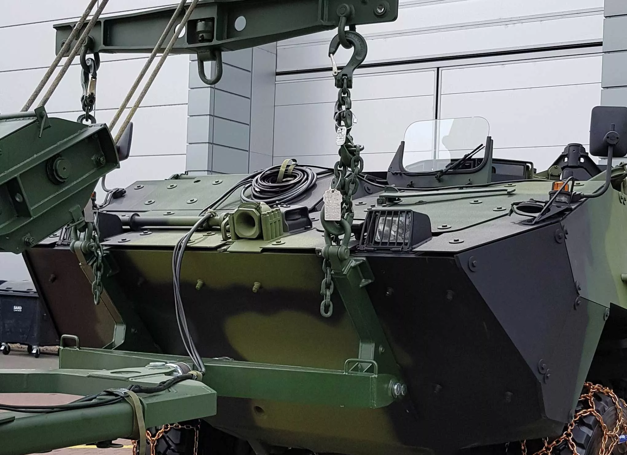Lifting chains attached to a military vehicle