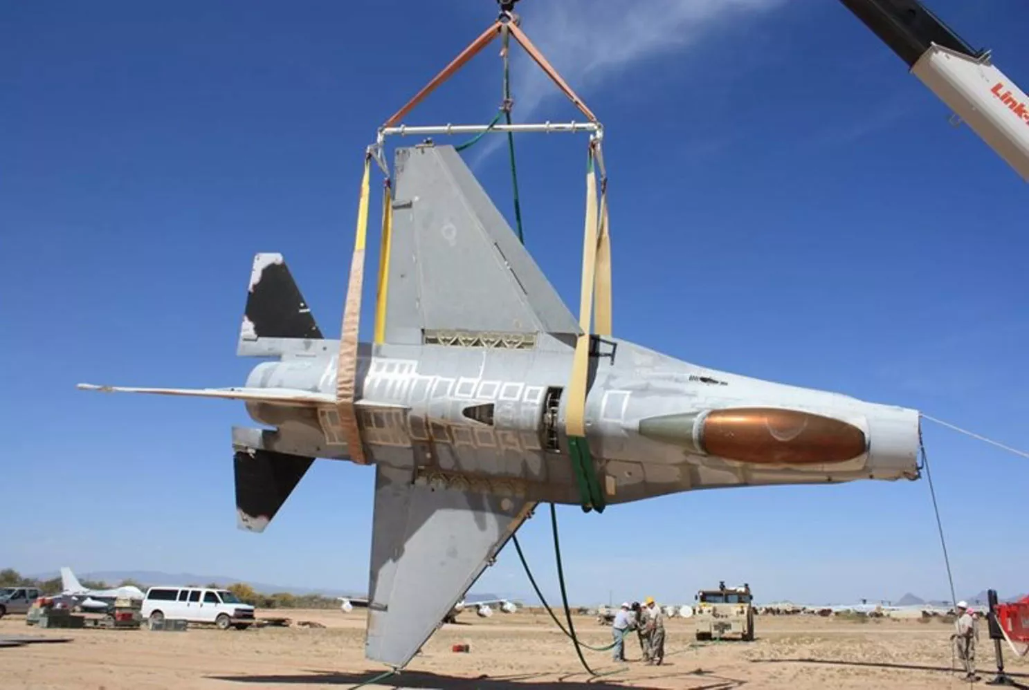 Military aircraft being lifted with a Modulift spreader beam system