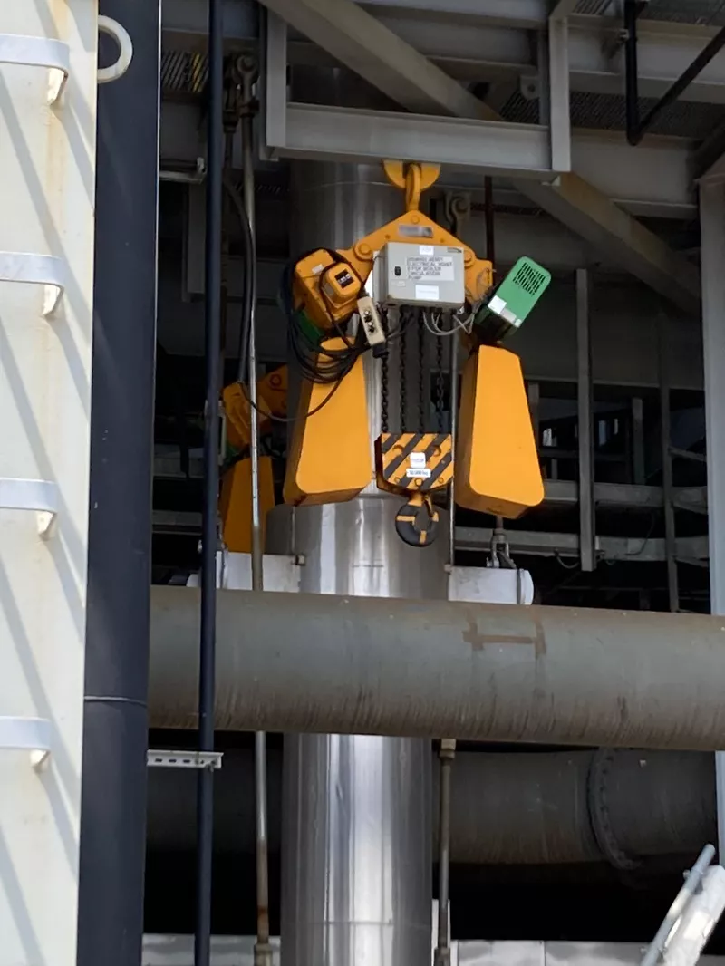 Replacement hoist chains in use at a concert - replacing the chain rather than the hoist makes economic sense
