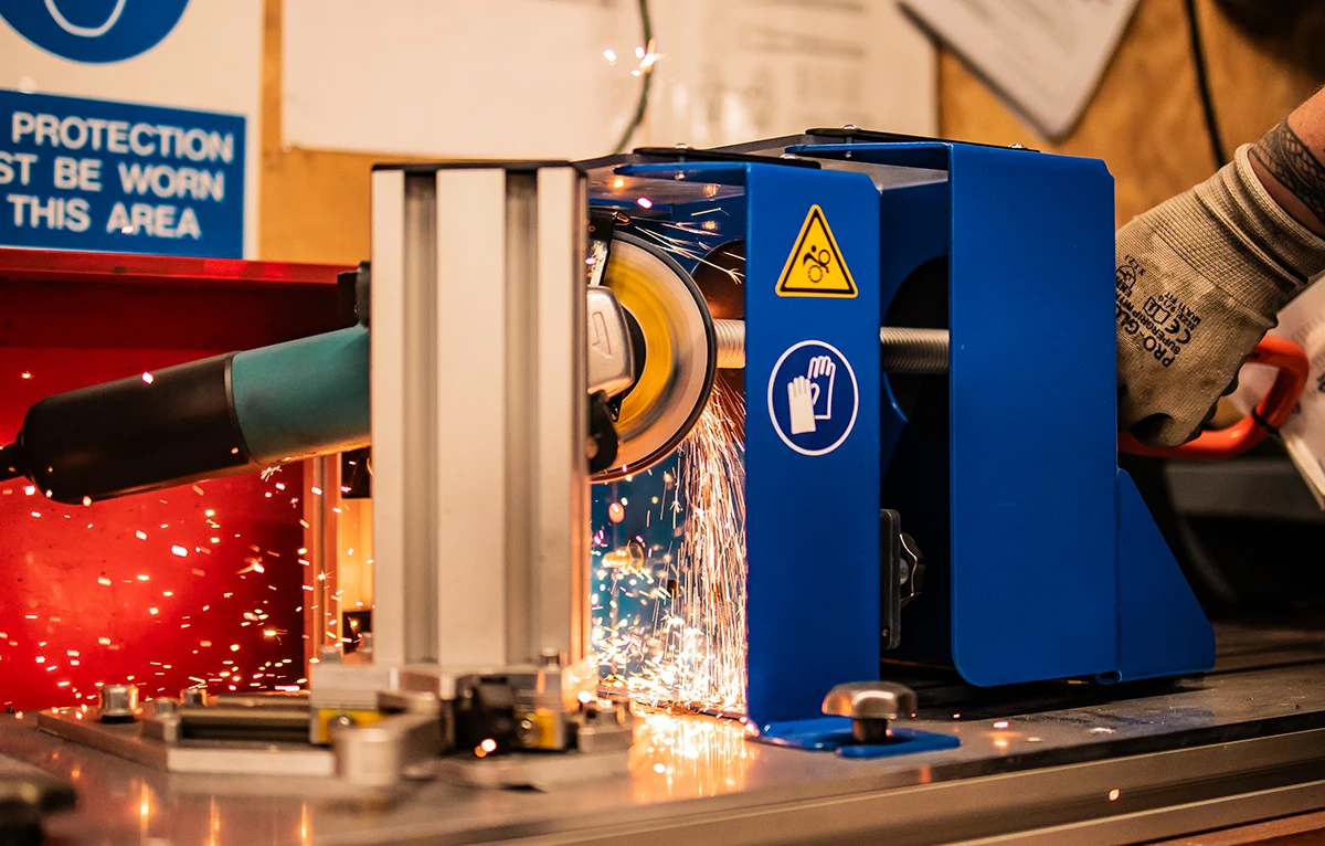 An engineer expertly creates a custom length bolt for lifting point or hoist ring.