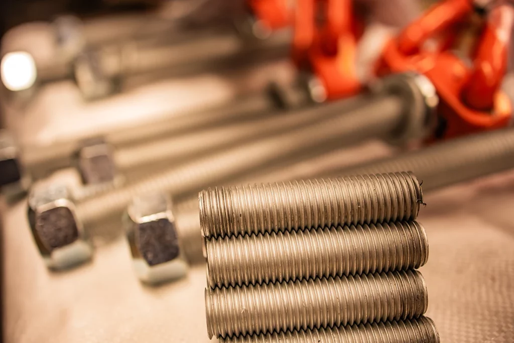 A set of expertly cut bolts attached to lifting points or hoist rings from pewag.