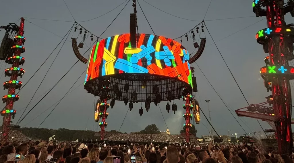 Hoist chains in action in an entertainment setting. Lights and other staging equipment are positioned using hoist chains.