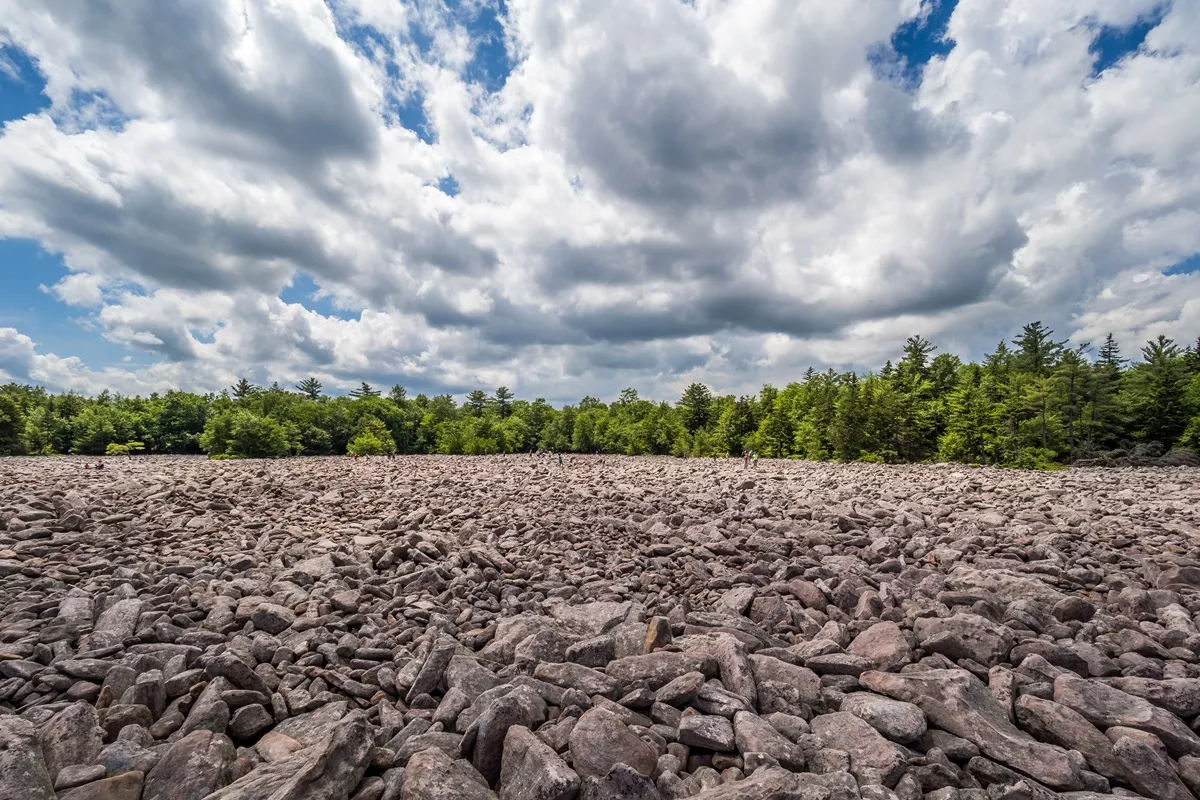 A rough, rocky surface illustrating the type of terrain tyre protection chains are subject to