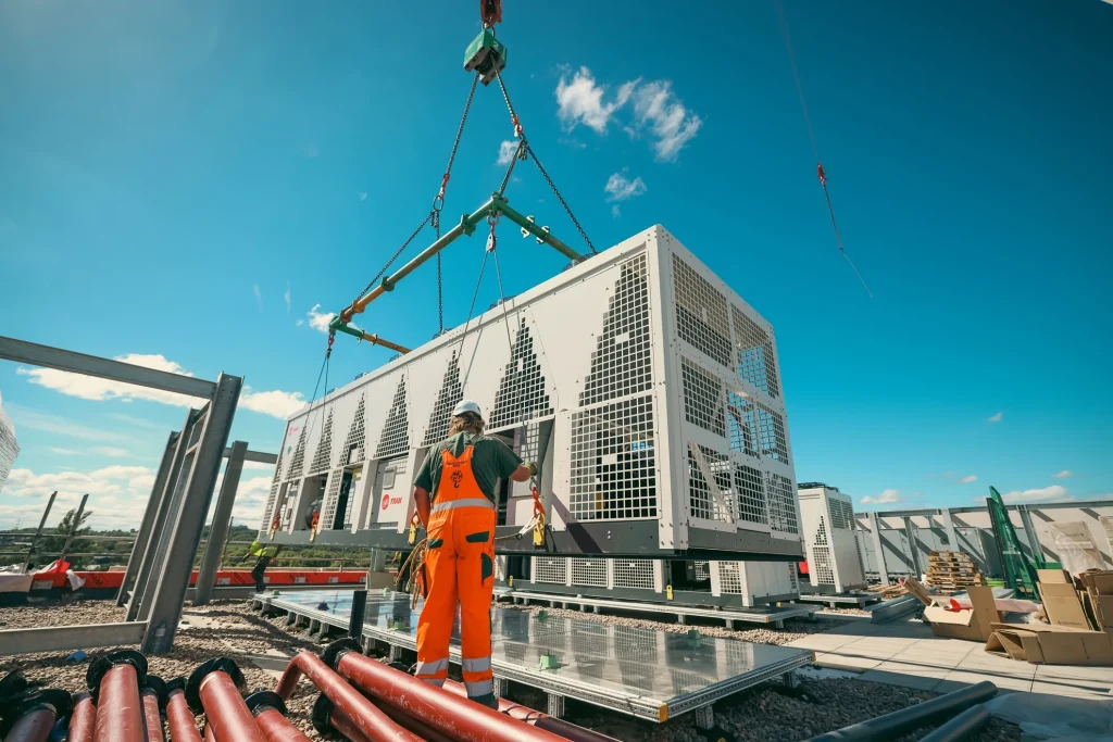 a pewag load balancer and modulift spreader beam being used to install a heat pump to an Oxford roof